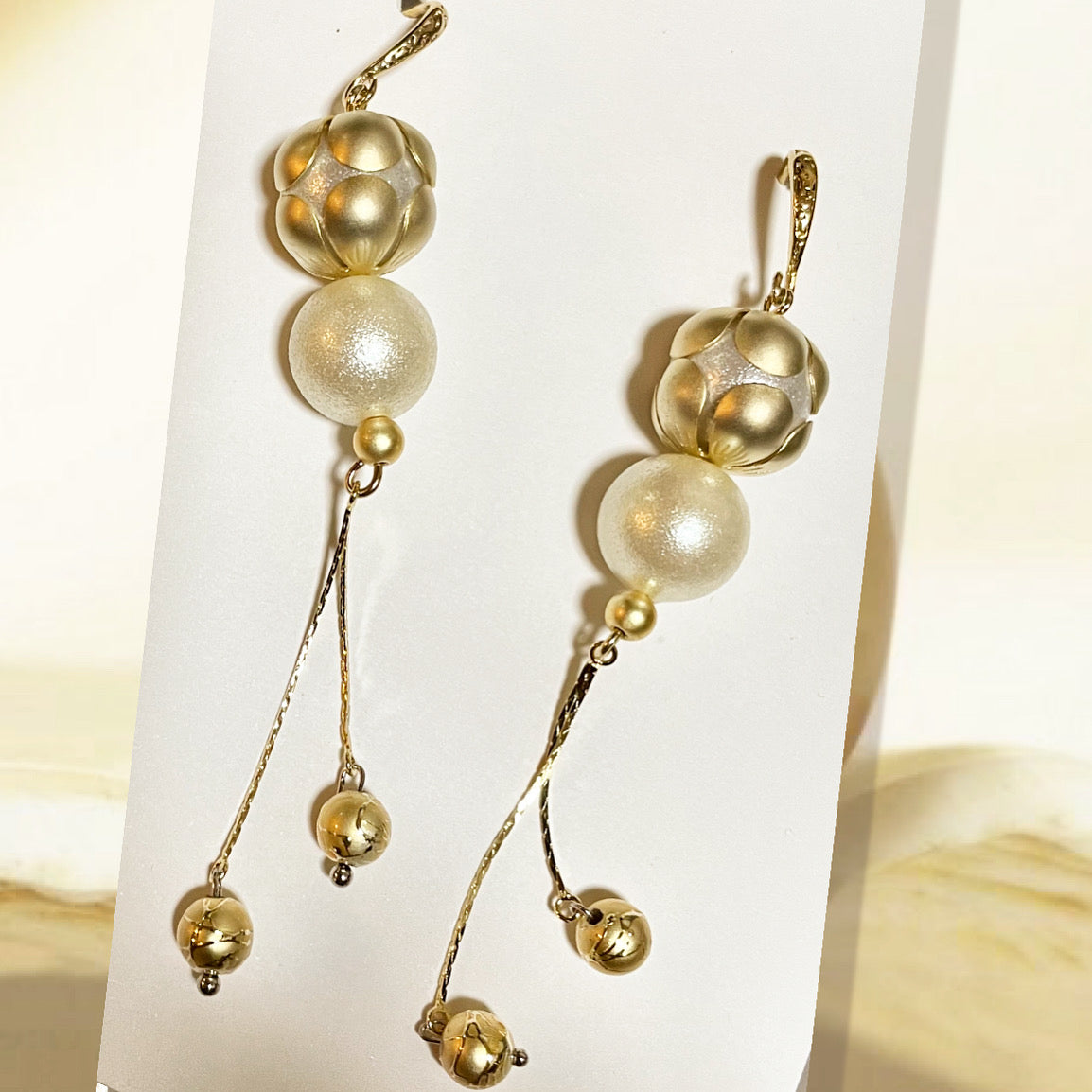 White cotton Pearl earrings with gold color frame