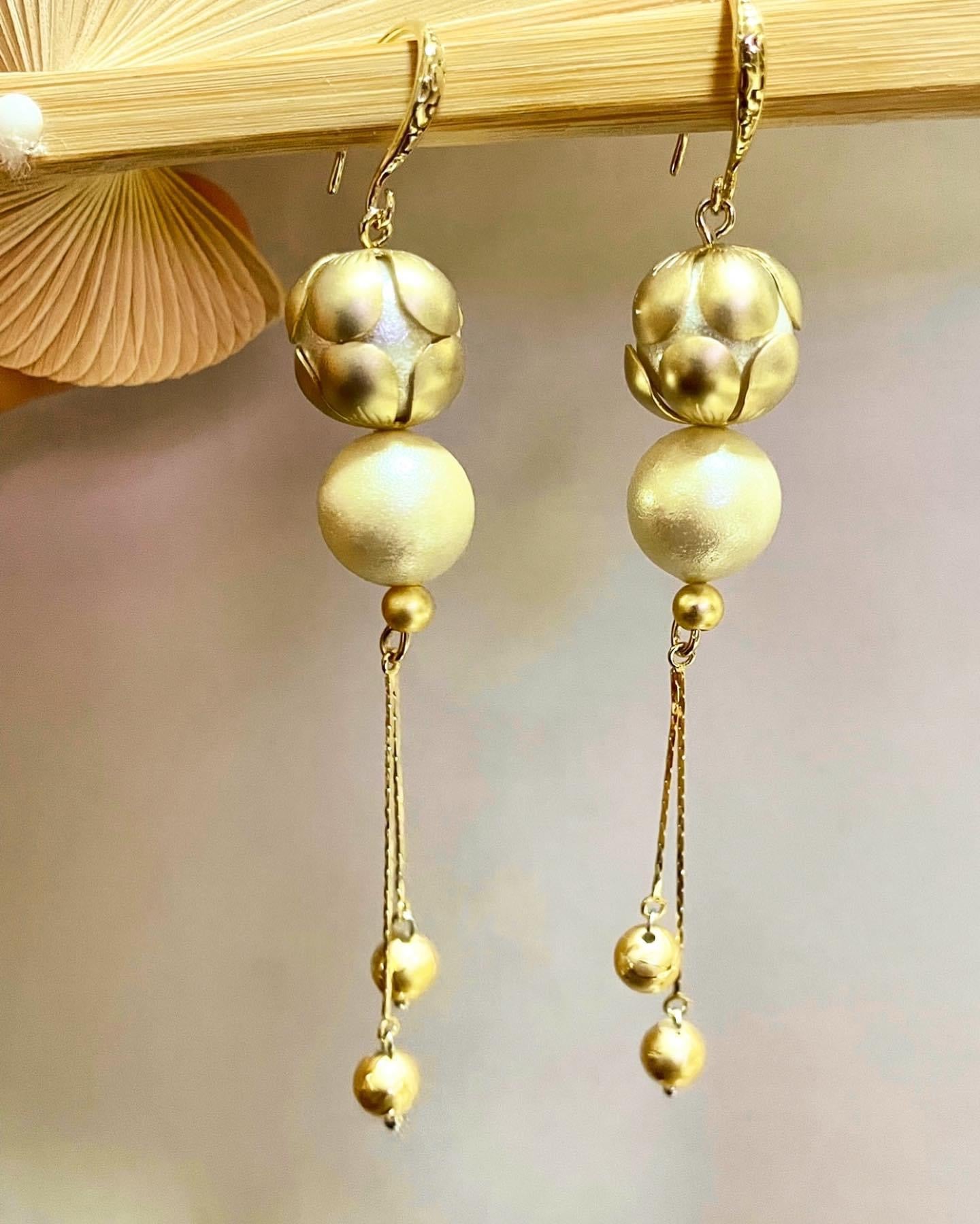 White cotton Pearl earrings with gold color frame
